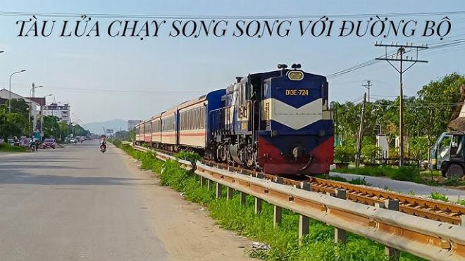 Tàu hỏa di chuyển trên hai đường ray song song, minh họa ứng dụng thực tế